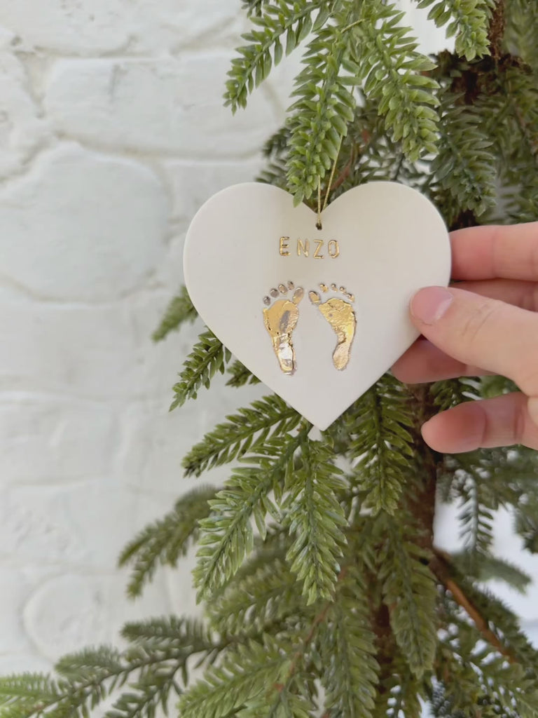 Personalized ceramic baby keepsake for newborn with footprints