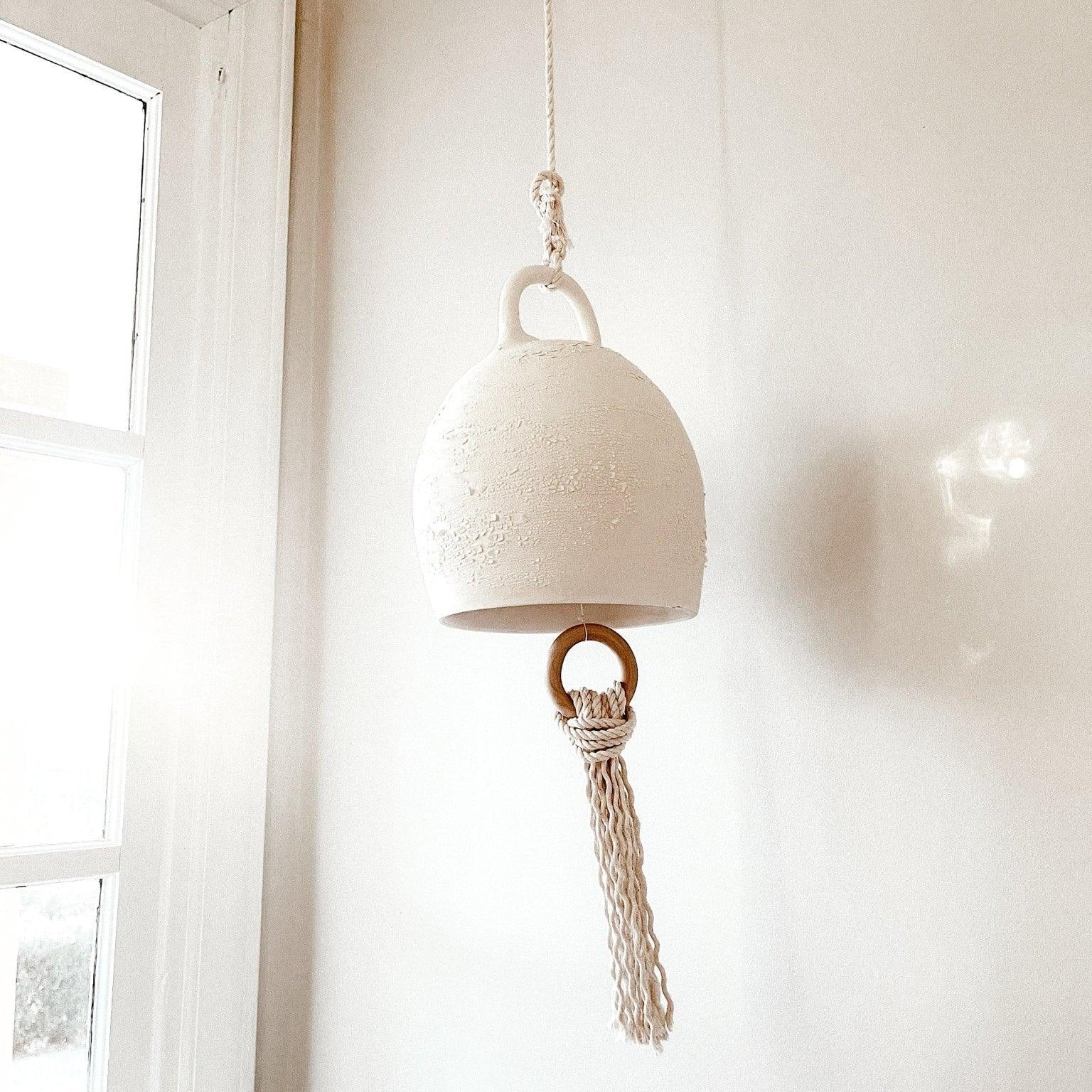 Handmade large curved ceramic bell with thick cotton rope