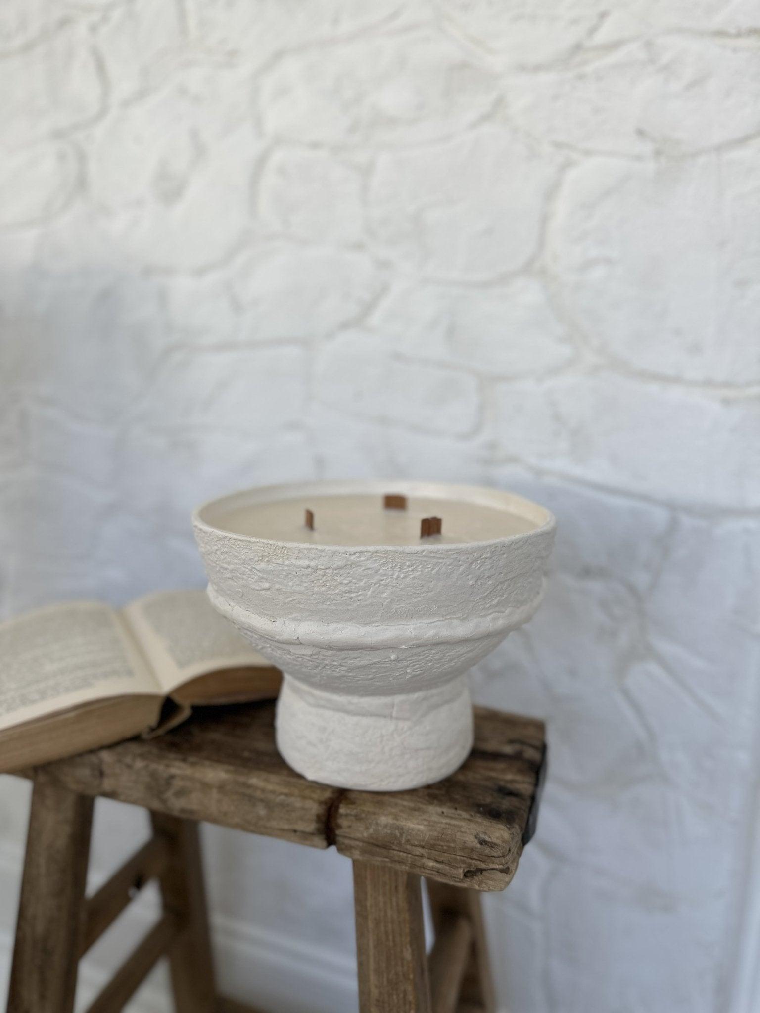 Handmade ceramic pedestal bowl soy candle with a wood wick, reusable after burning