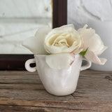 Petite handmade ceramic bud vase with small handles by Muddy Heart
