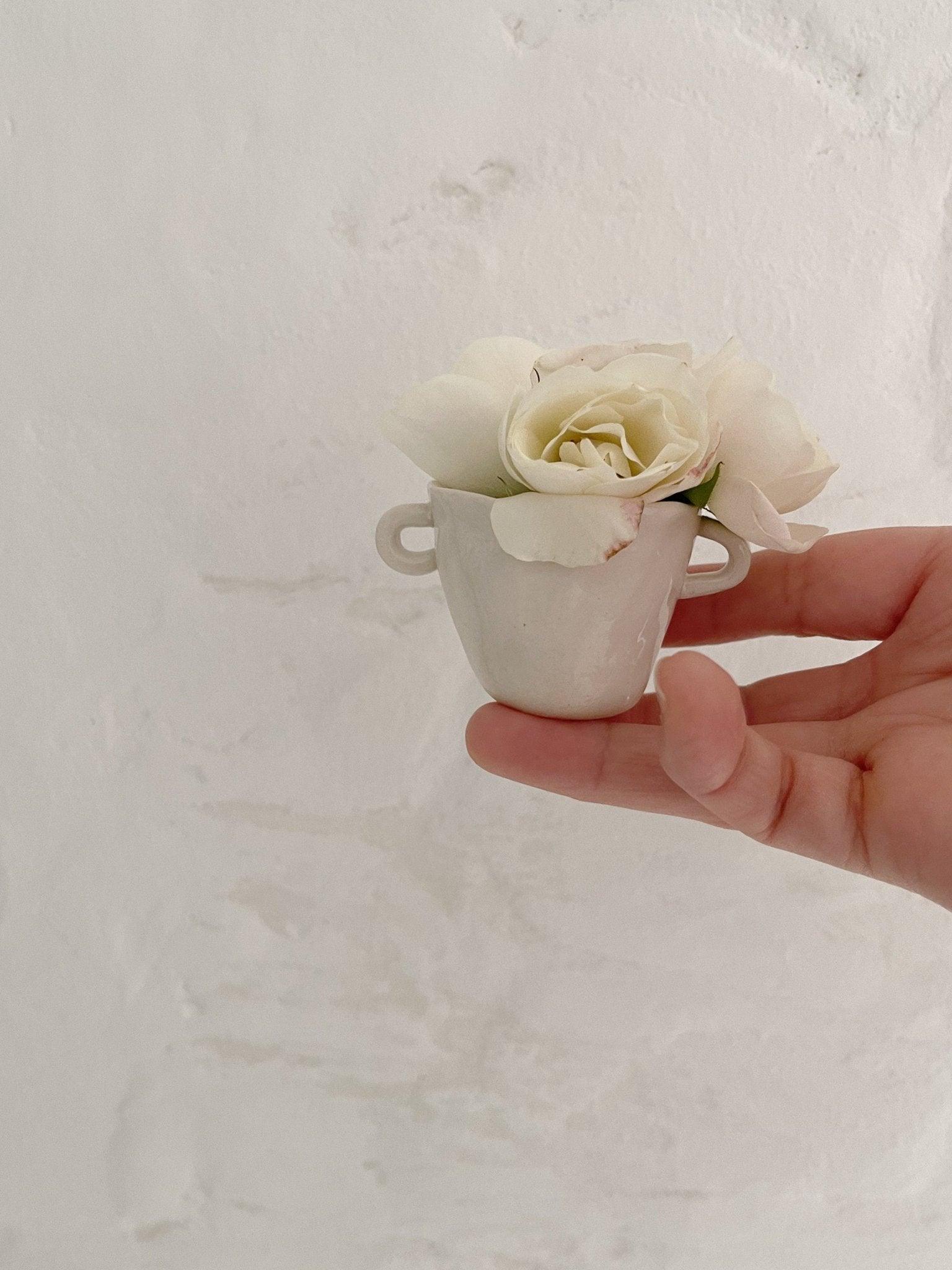 Petite handmade ceramic bud vase with small handles by Muddy Heart