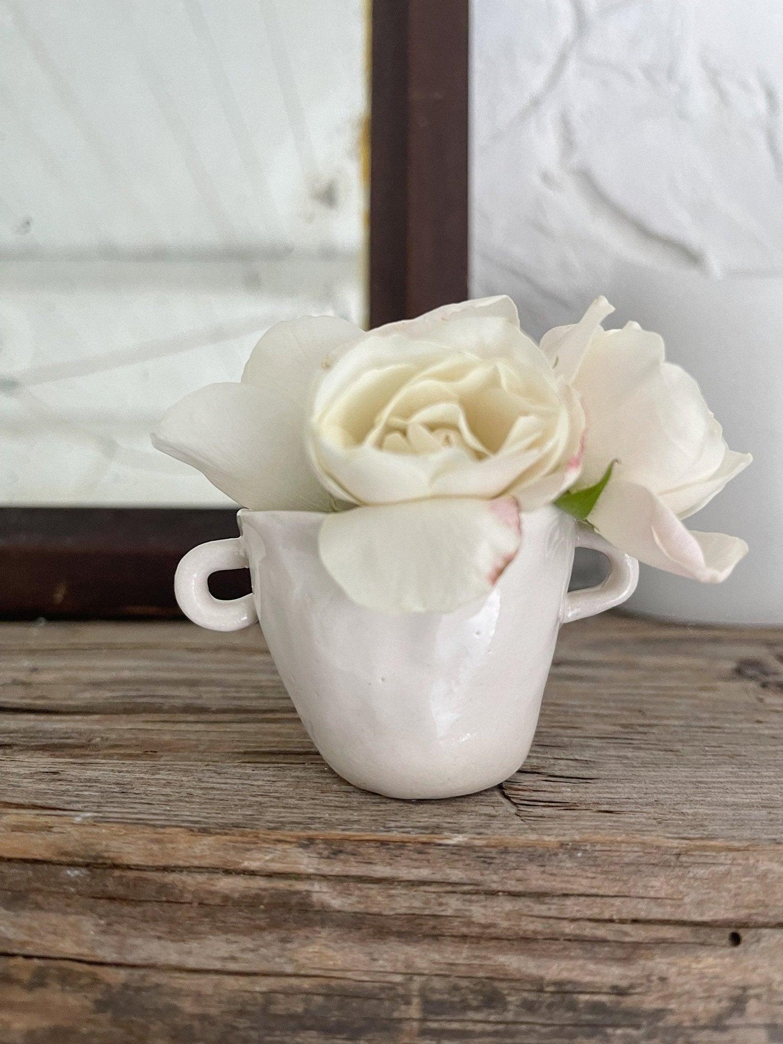 Petite handmade ceramic bud vase with small handles by Muddy Heart