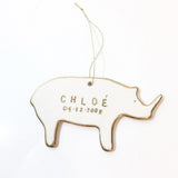 Handmade porcelain rhino ornament with 22K gold luster and custom name by Muddy Heart