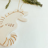 Personalized porcelain seahorse ornament with 22K gold luster by Muddy Heart