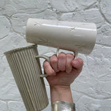 Handmade tall stoneware mug with star or stripe design