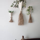Handmade ceramic pyramid wall planter with a jute tassel