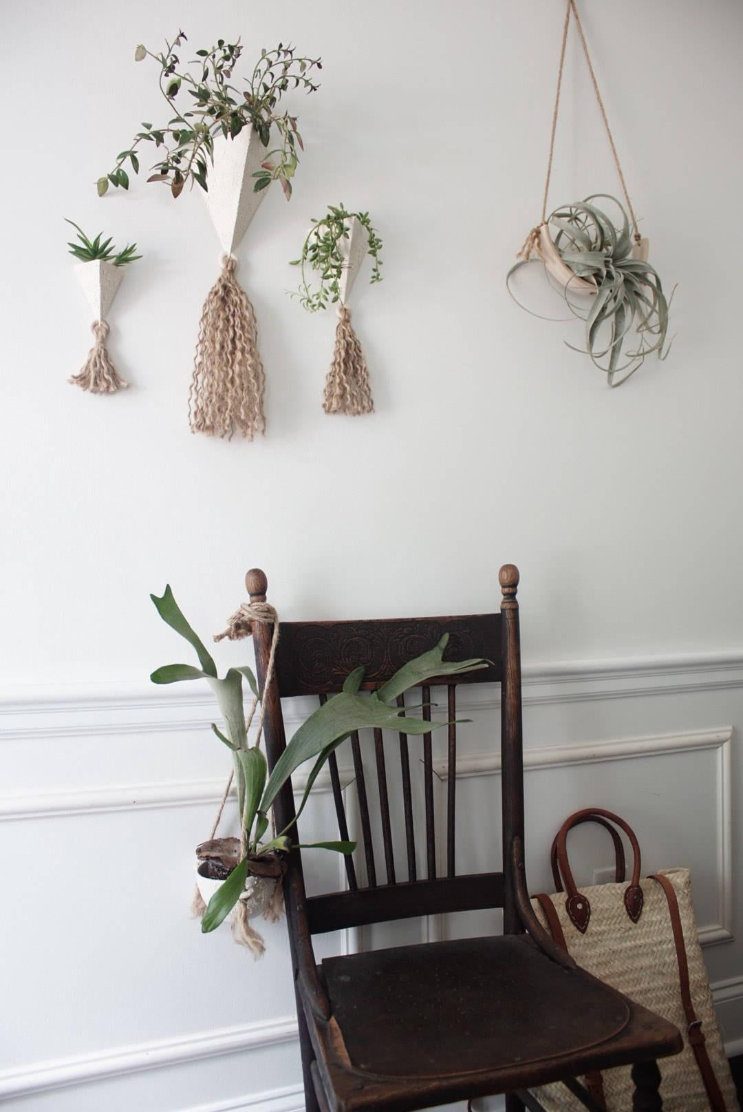 Handmade ceramic pyramid wall planter with a jute tassel