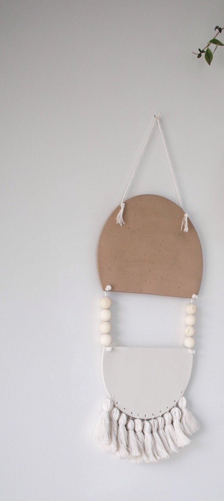 Handmade stoneware tribal wall art hanging in neutral tones by Muddy Heart