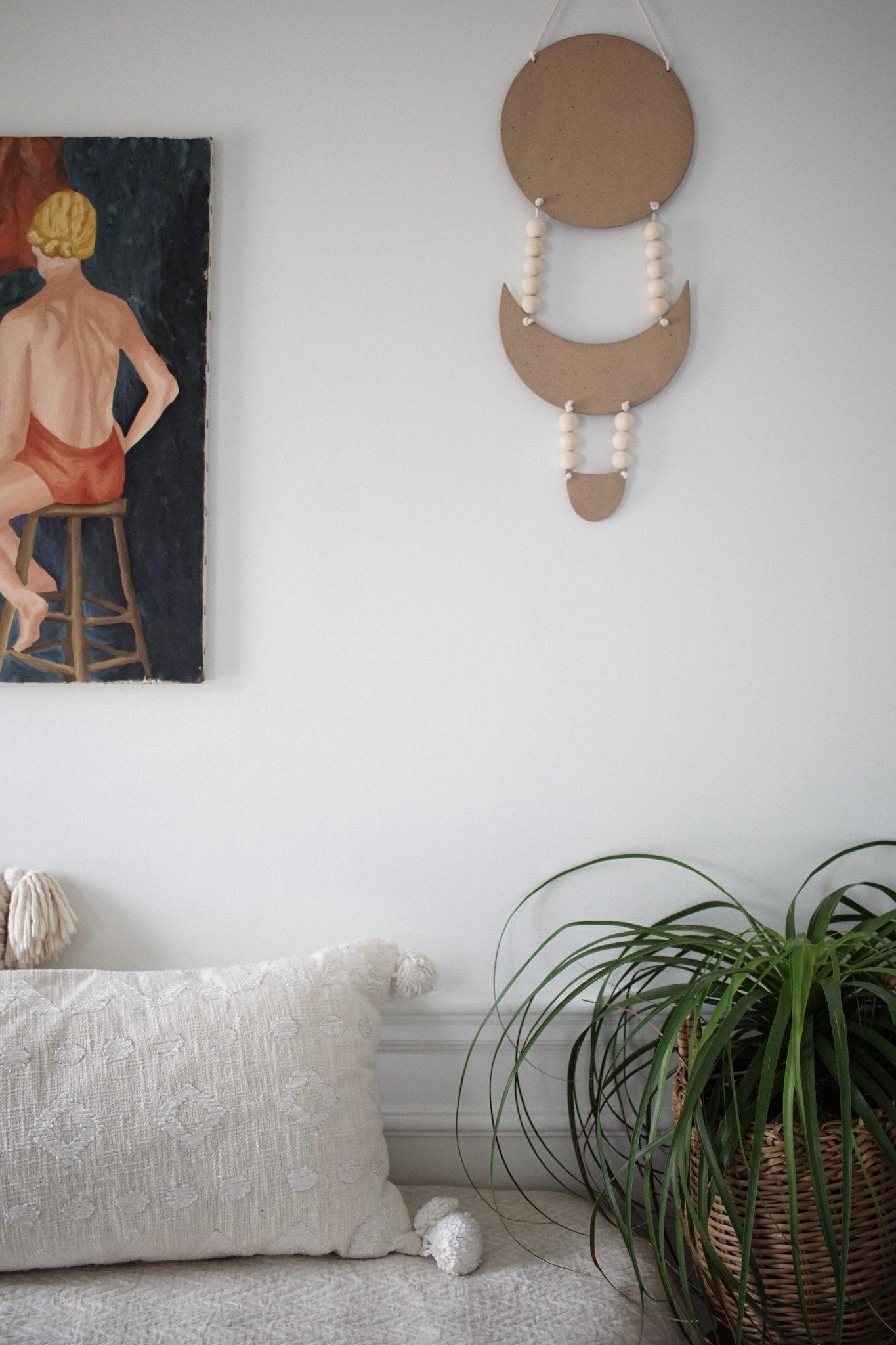 Handmade stoneware tribal wall hanging with rope detail by Muddy Heart